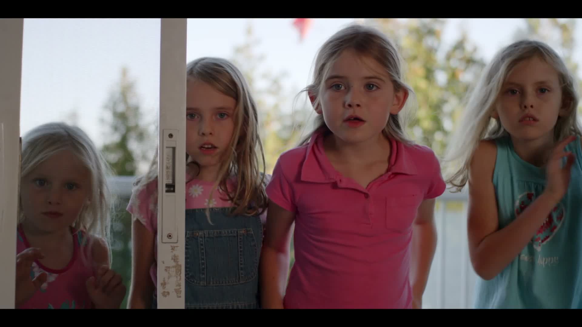 The four girls at the cottage door