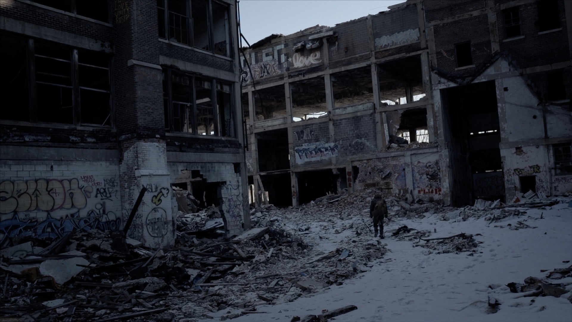 Danny walks through the ruins